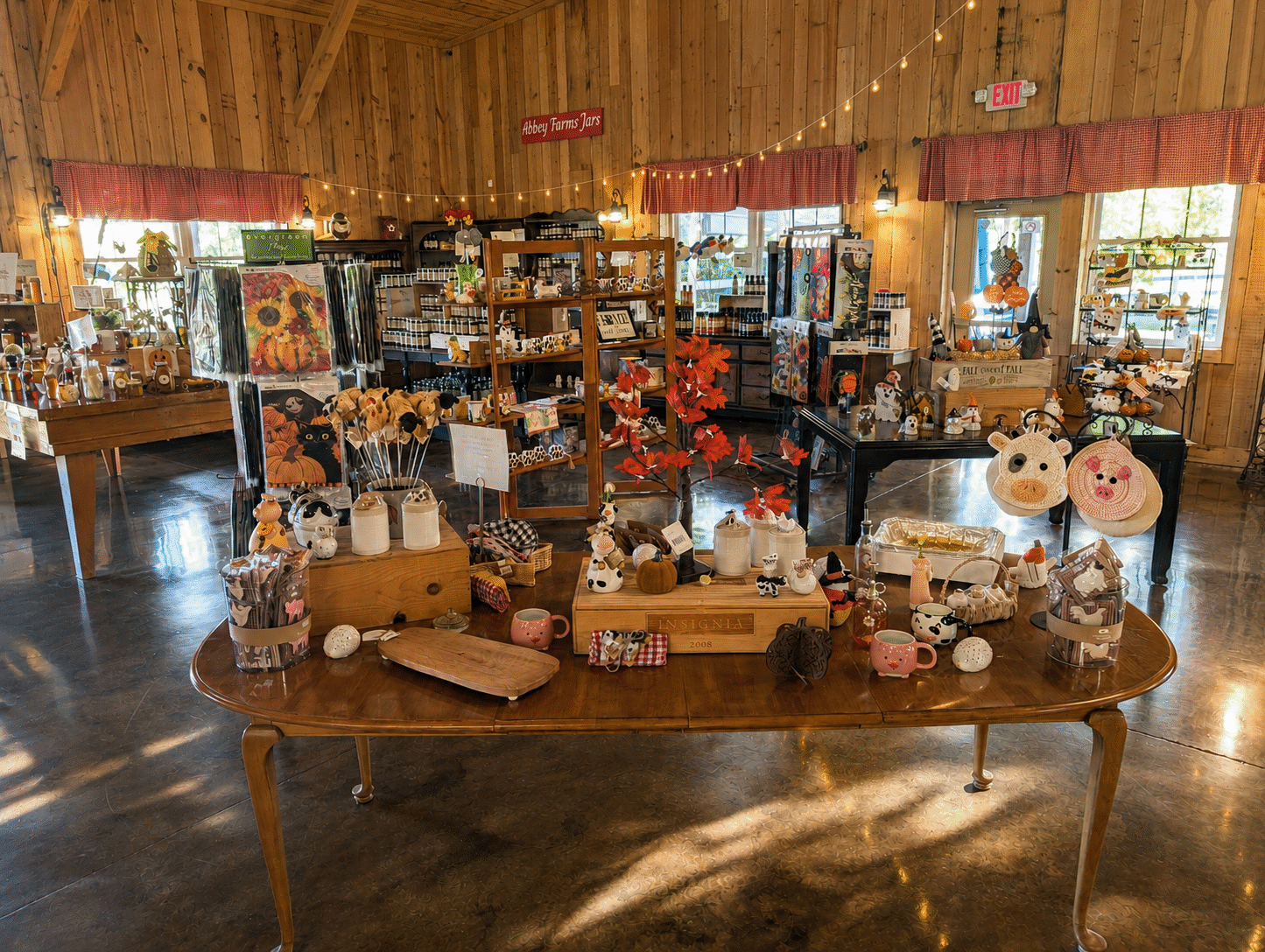 The wood-shelved interior of the Nagel Farmstead Emporium at Abbey Farms